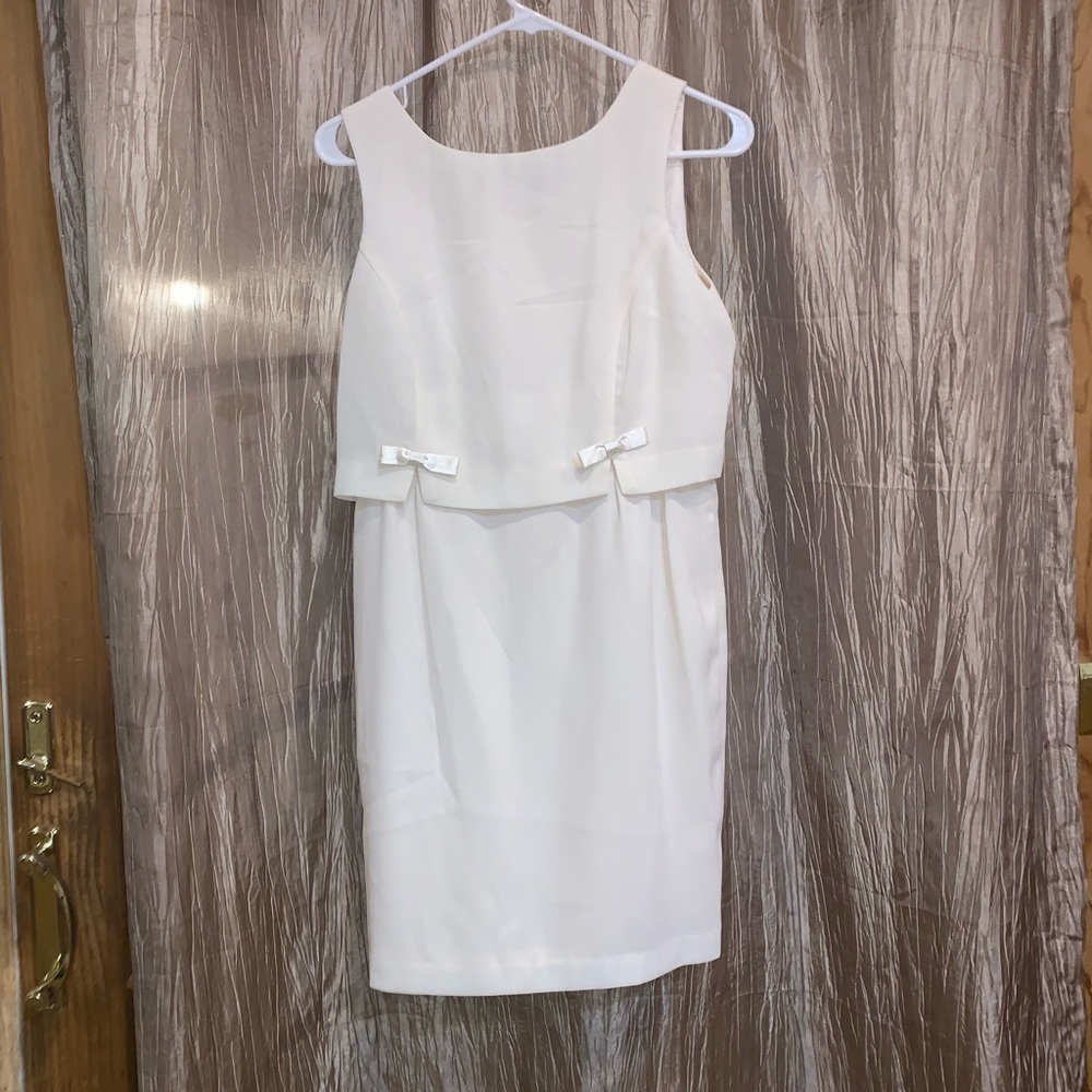 White dress with bow details